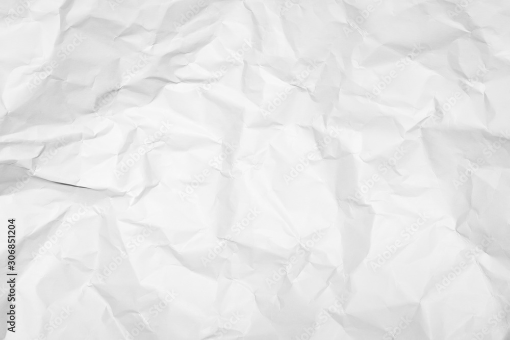 White crumpled paper texture background.