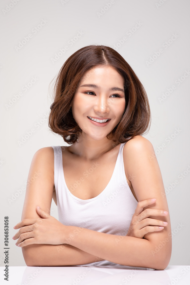 Beautiful Asian woman with short hairs looking While smile with clean and fresh skin Happiness and cheerful with positive emotional,isolated on gray background,Beauty and Cosmetics Concept Beautiful Asian woman with short hairs looking While smile with clean and fresh skin Happiness and cheerful with positive emotional,isolated on gray background,Beauty and Cosmetics Concept