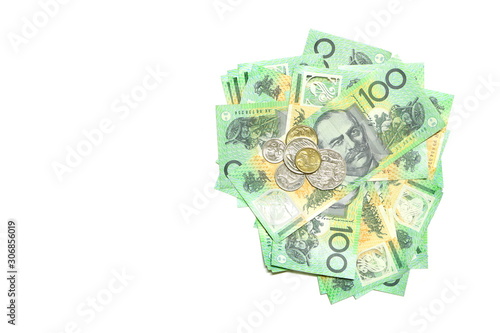 Group of 100 dollar Australian notes pile and coins of Australian money on white background have copy space for put text