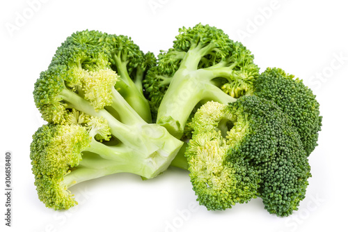 Branches of fresh broccoli on a white background close-up