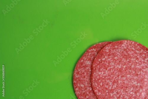 slices of salami in colorful background