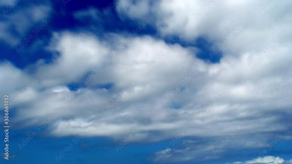 Time Lapse, White Fluffy Clouds On Dark Blue Sky Time Lapse, White Fluffy Clouds On Dark Blue Sky