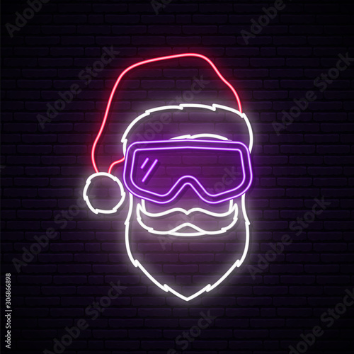 Santa Claus with white beard wearing red hat and snowboard mask.  Santa neon sign. Vector Christmas illustration.