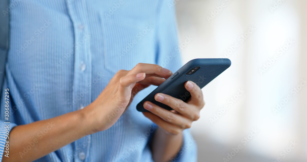 Close up of woman use of mobile phone in city Close up of woman use of mobile phone in city