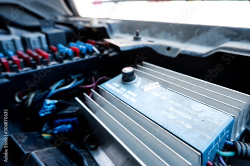 Power Inverters, DC to AC from separate car batteries on a white background photo