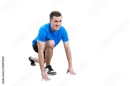 Asian runner man in a ready position to run
