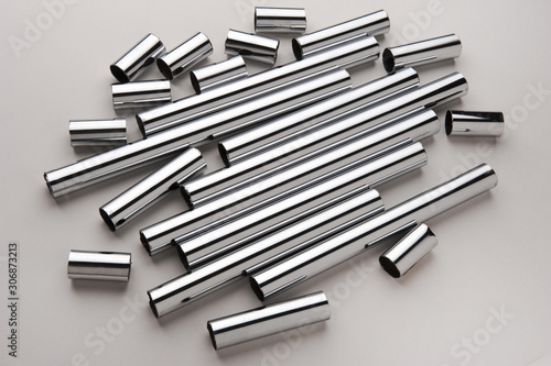 Chrome silver pipes on the gray background