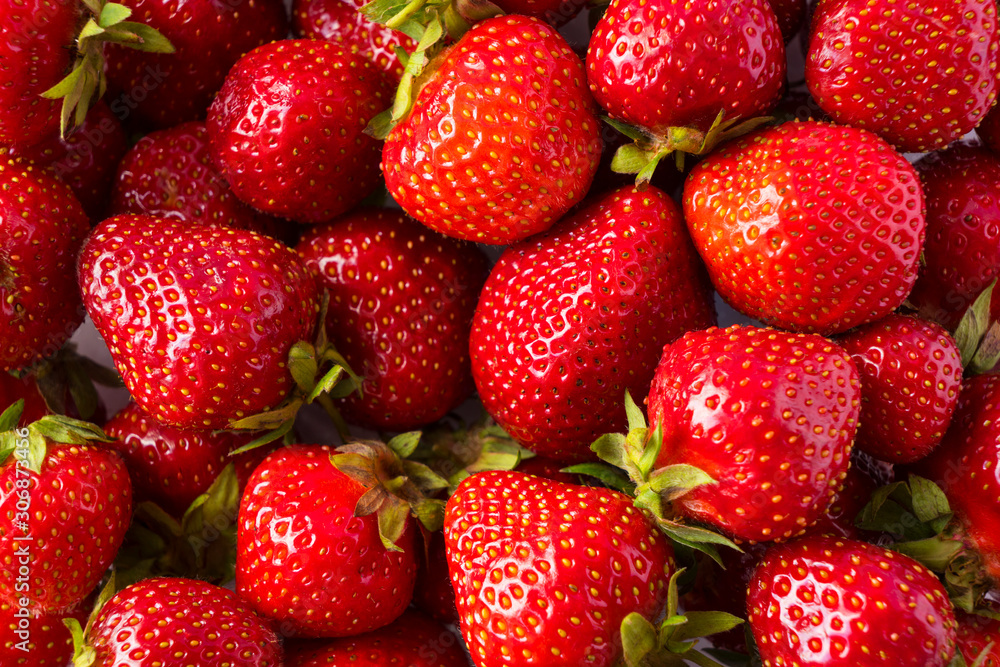 Background of fresh strawberries. Ripe strawberries. Ripe berries close-up. Various fresh summer berries. Background of red berries. Background of fresh strawberries. Ripe strawberries. Ripe berries close-up. Various fresh summer berries. Background of red berries.