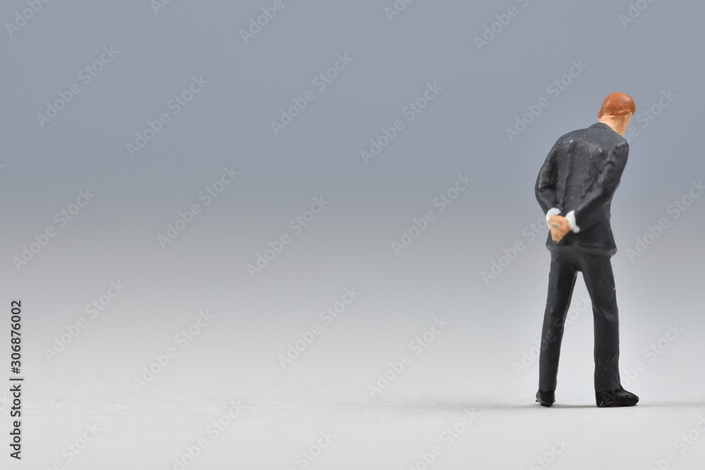 mini business men standing