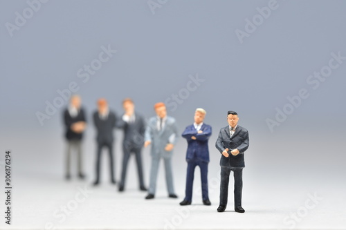 mini business men standing