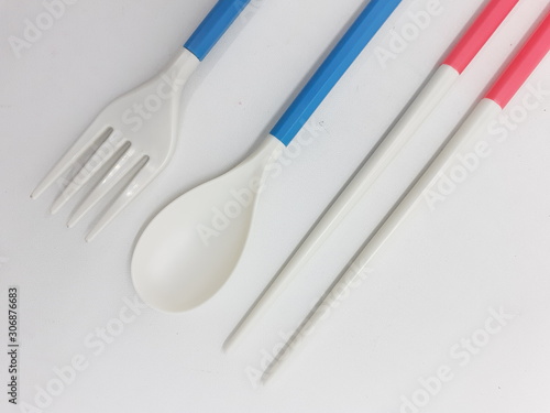 Beautiful Cute Luxury Modern Plastic Ceramics Folded Compact Detachable Eating Cutlery Spoon Fork Packaging for Dining Kitchen Appliances in White isolated Background
