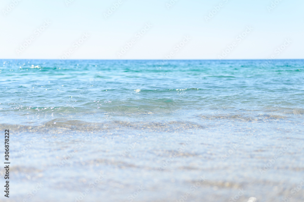 Seascape. Beautiful landscape horizon with sea and clear sky. Outdoor activity in the nature. Wave close up