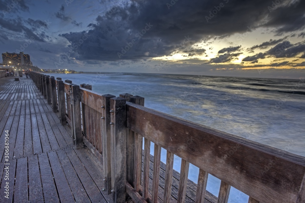 sunset at a wooden pier