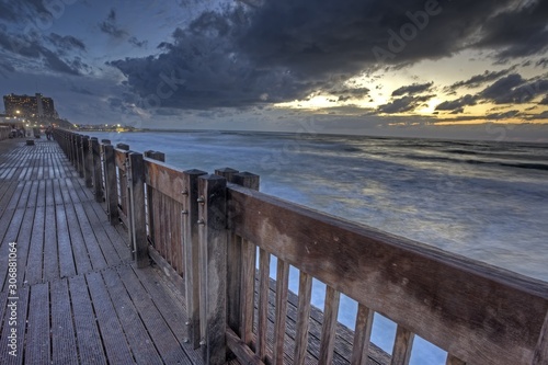 sunset at a wooden pier © Nim Aronow 