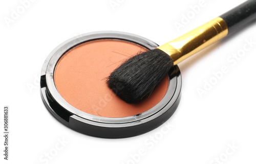 Face powder in round packaging, container with brush isolated on white background