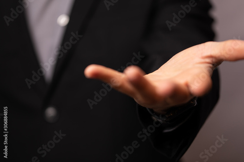 Businessman without head holding something without theme