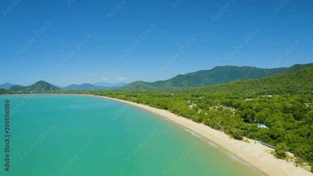 Aerial, beautiful view on huge sand beach and a coastline in Palm Cove, Cairns in Queensland, Australia Aerial, beautiful view on huge sand beach and a coastline in Palm Cove, Cairns in Queensland, Australia