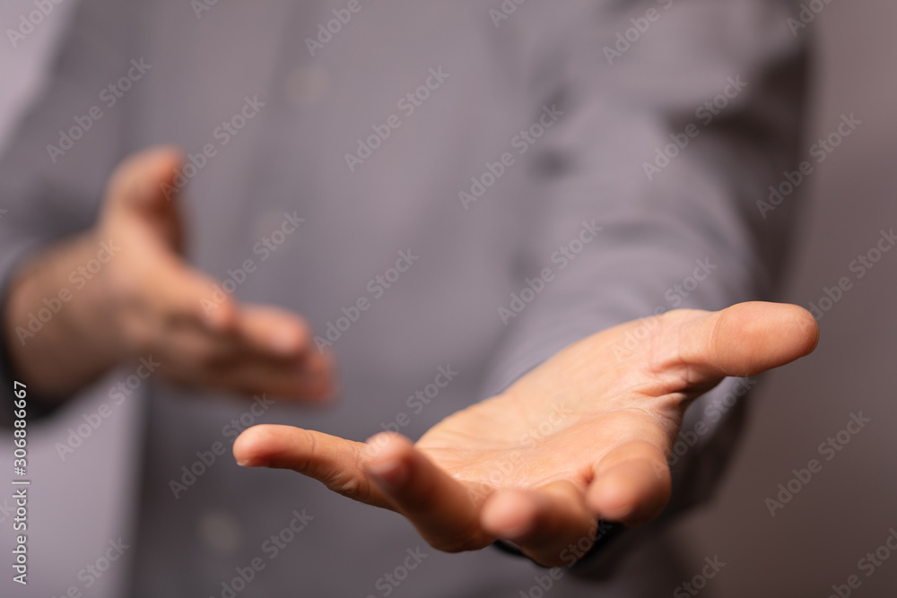 Fototapeta premium Businessman without head holding something without theme