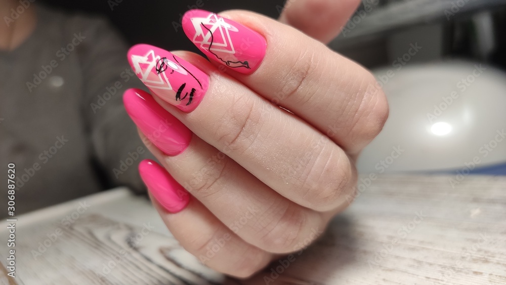 Trendy manicure design on a beautiful background. Trendy manicure design on a beautiful background.