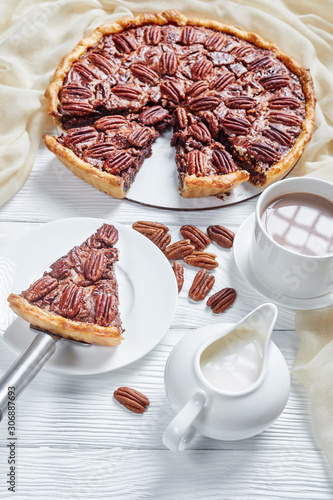 close-up of pecan pie sliced on a plate photo