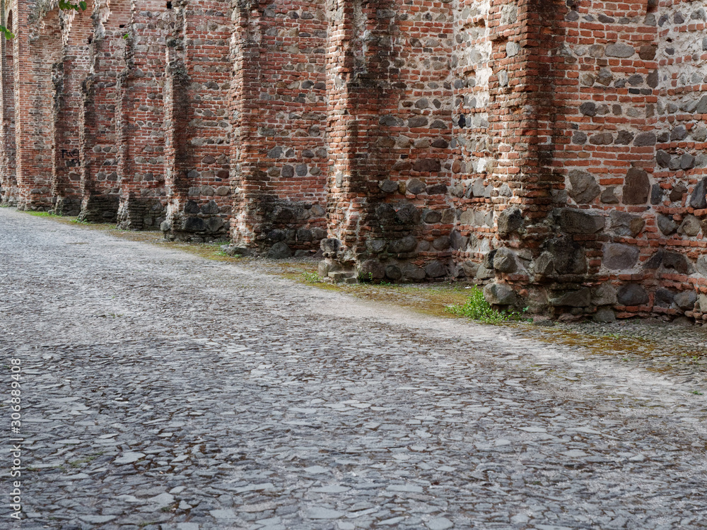 Naklejka premium Montagnana, ITALY - August 26, 2019: Red brick fortress wall of the old city