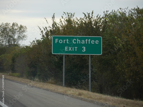 Roadside sign with directions to Fort Chaffee exit in Arkansas, USA. photo