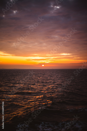 sunset over the ocean © The Protograph