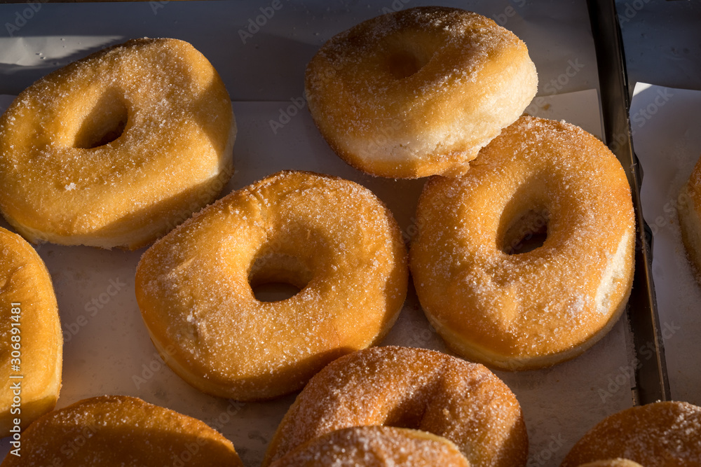 Fried donut with sugar outdoor Fried donut with sugar outdoor