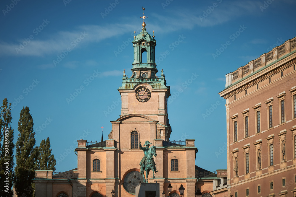The Statue of Karl XIV Johans and Church of St. Nicholas in Stockholm, Sweden