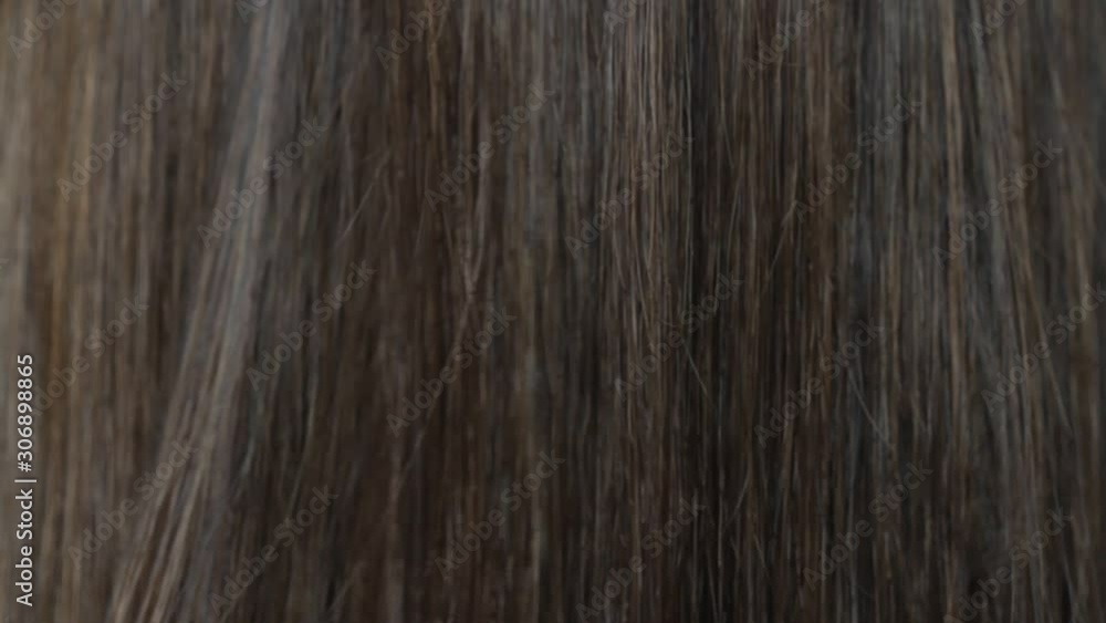 Close-up beautiful long smooth straight brown hair texture. Haircare concept, extensions, hair abstract background. HD video. Close-up beautiful long smooth straight brown hair texture. Haircare concept, extensions, hair abstract background. HD video.