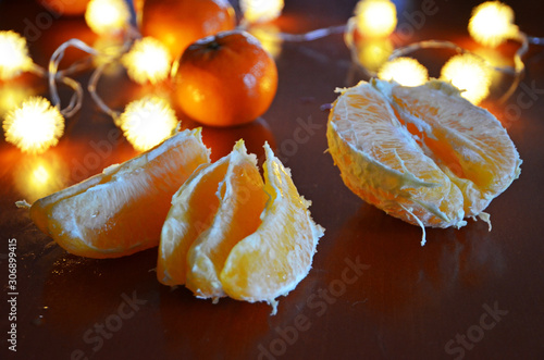 tangerines and Christmas garland. New Year and Christmas concept