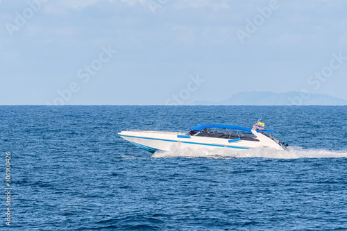 Speed boat on azure sea in turquoise blue water. © Look Aod 27
