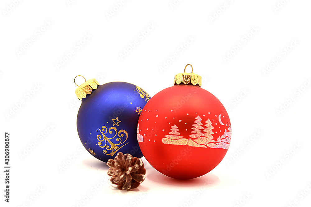 Photo of decorations for Christmas and New Year, a composition of decorations for the Christmas tree, holiday Christmas balls, isolated on white background Photo of decorations for Christmas and New Year, a composition of decorations for the Christmas tree, holiday Christmas balls, isolated on white background