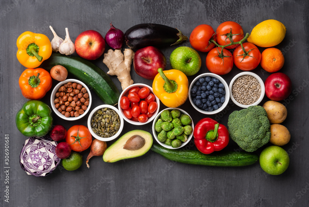Fototapeta Healthy eating ingredients: fresh vegetables, fruits and superfood. Nutrition, diet, vegan food concept