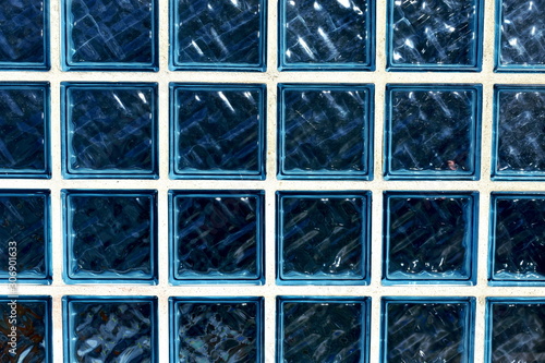 Blue glass bricks background. Blue glass bricks texture.