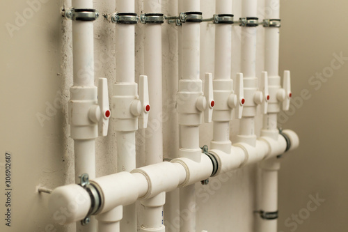 clean line white water pipes watering system pipe engineer design in underground. plastic white pipe heating manifold