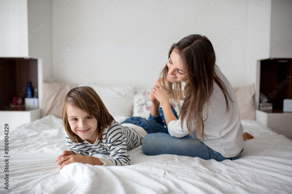 Mother, tickling her little boy, child giggling at home with mom Stock ...