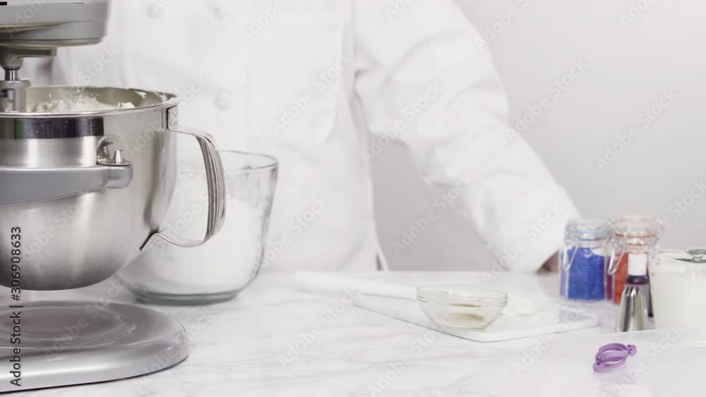 Step by step. Mixing ingredients in standing kitchen mixer to make buttercream frosting. Step by step. Mixing ingredients in standing kitchen mixer to make buttercream frosting.