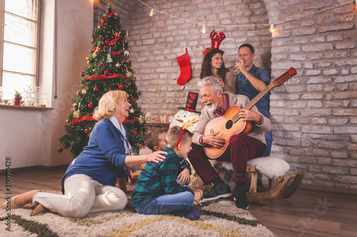 Happy family singing Christmas songs