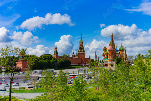 Moscow. Russia. View of the Kremlin on a summer day. Red square. St. Basil's Cathedral. Kremlin wall. The Kremlin on the background of green trees. Travel to Russia.