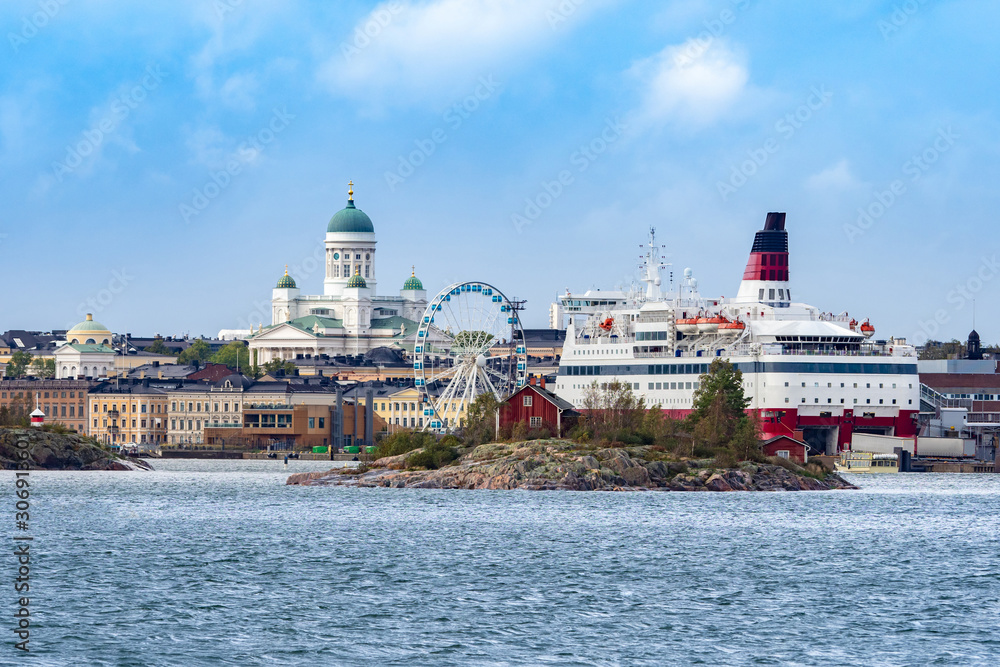 Helsinki. Finland. Cruise ship on the background of the panorama of Helsinki. Sights Of Helsinki. Ferris wheel. Suurkirkko. Cathedral Of St. Nicholas. Picturesque Islands in the Harbor. Scandinavia