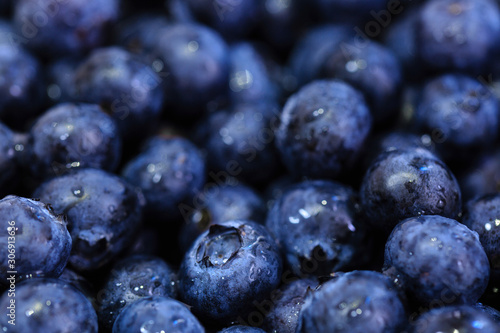 Fresh blueberry background. Texture blueberry berries close up view