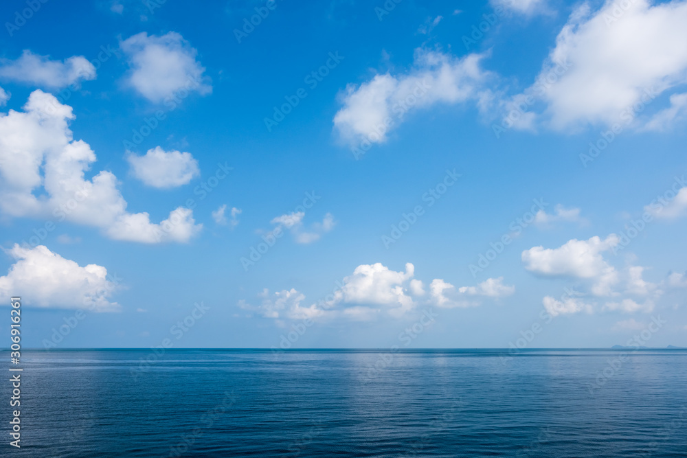 Sea on blue sky with cloud background