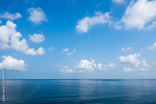 Sea on blue sky with cloud background