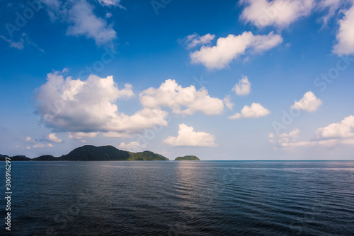 Sea and island with the rain cloud background