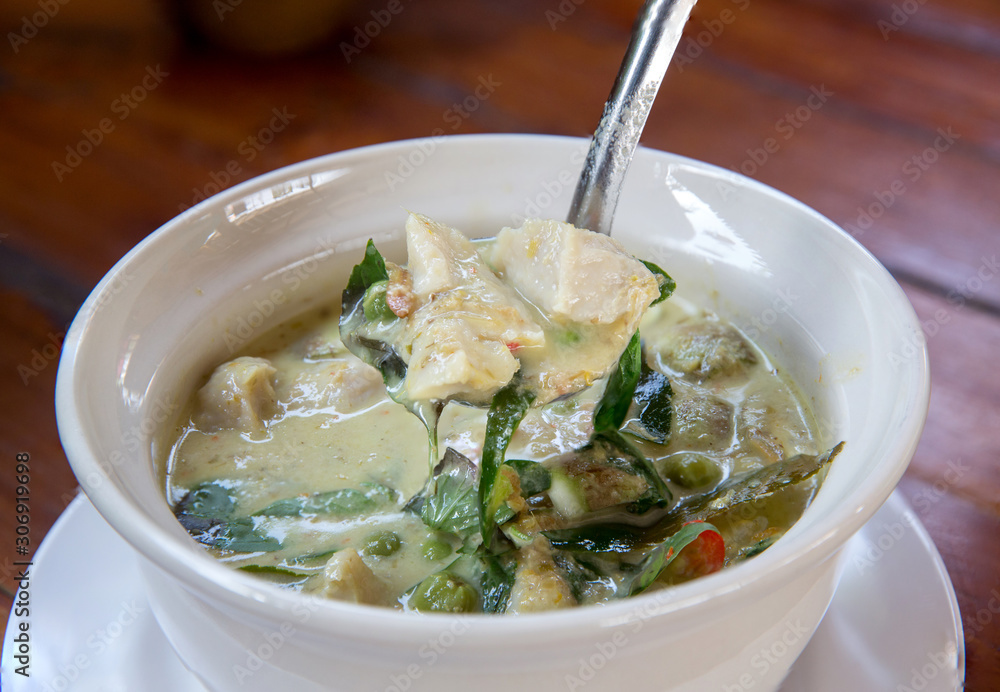 Green Chicken Curry,Thai cuisine. Delicious homemade butter fish curry with coconut,mangoes and spices. Tasty King fish curry made of coconut milk. Green Chicken Curry,Thai cuisine. Delicious homemade butter fish curry with coconut,mangoes and spices. Tasty King fish curry made of coconut milk.