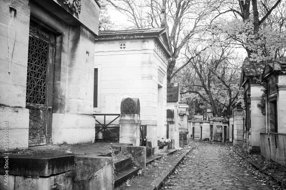 Paris, France - November 18, 2019: Graves and crypts in Pere Lachaise Cemetery, This cemetery is the final resting place for many famous people Paris, France - November 18, 2019: Graves and crypts in Pere Lachaise Cemetery, This cemetery is the final resting place for many famous people