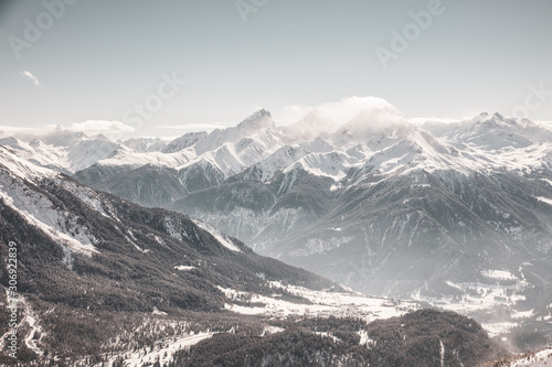 Piz Ela, Tinzahorn und Piz Mitgel mit Lantsch/Lenz im Vordergrund photo