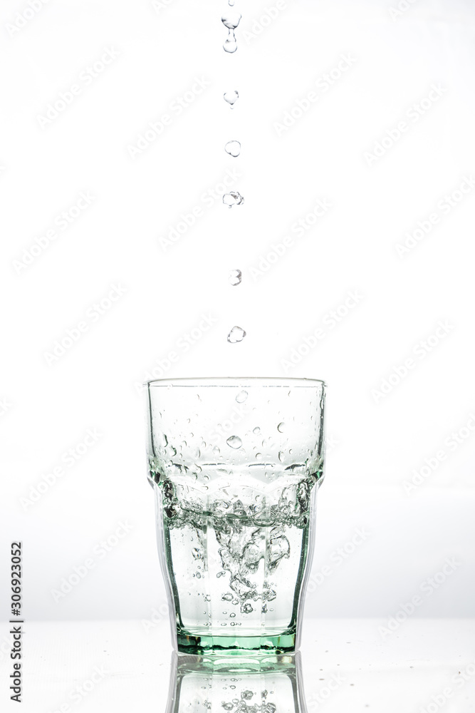 in glass transparent the glass pours clean water in glass transparent the glass pours clean water