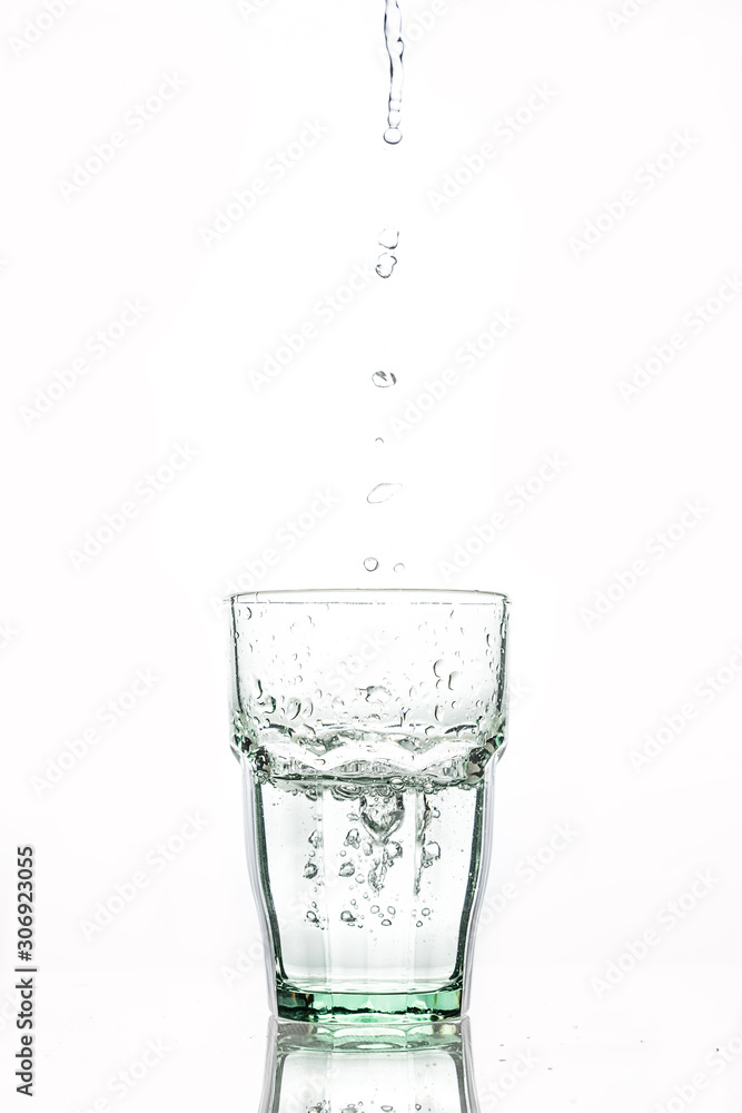 in glass transparent the glass pours clean water